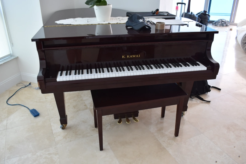 Baby Grand Piano that is moved by Top Notch Movers. Piano Moving Service in Fort Lauderdale.
