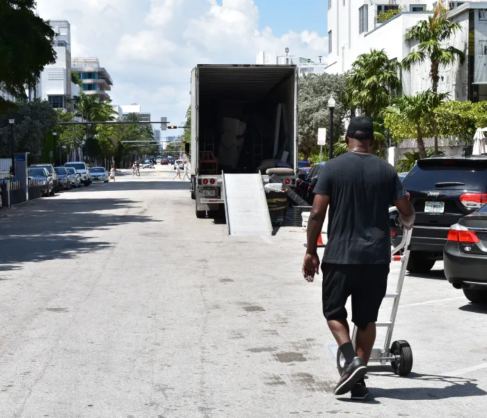 Miami Movers loading a truck in Miami, FL.